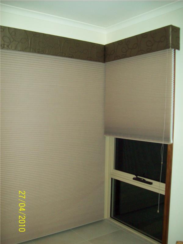 View blockout honeycombs under upholstered pelmets