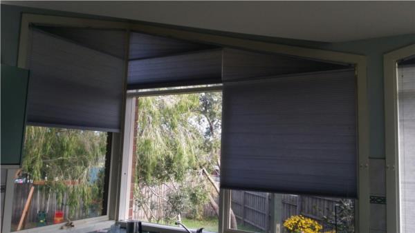 Light filtering large angled honeycomb blinds
