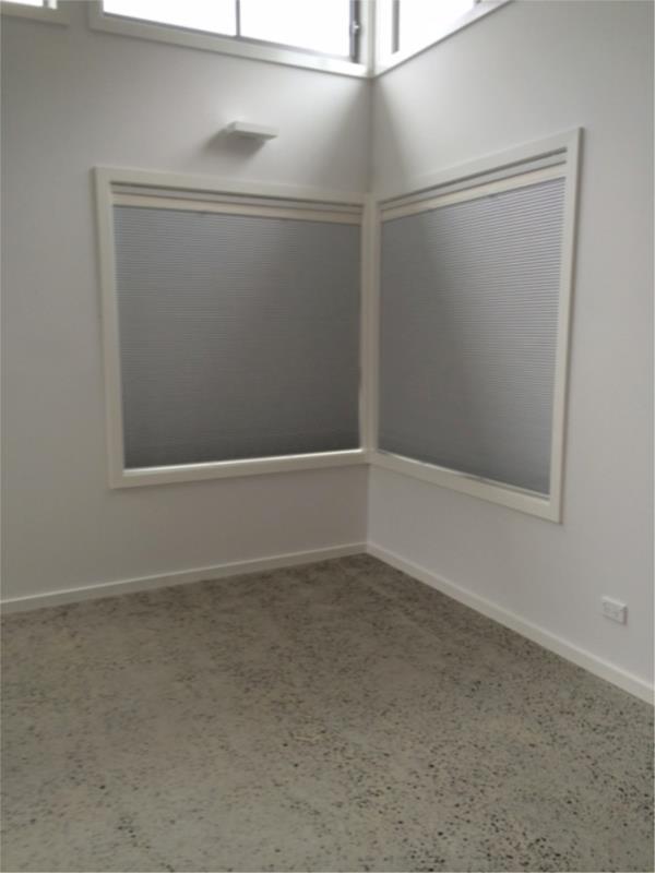 Portrait day night honeycomb blind closed